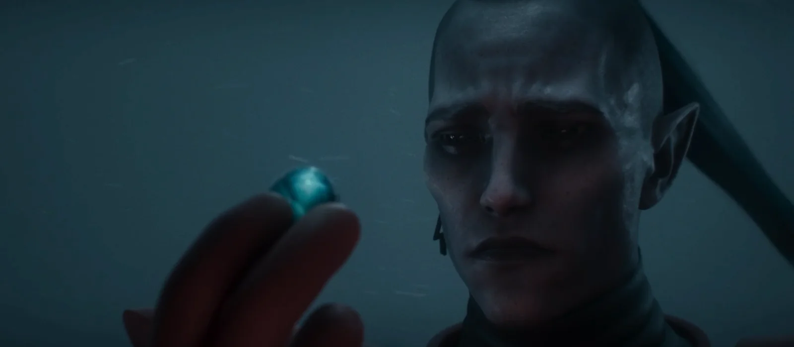 An Aeldari and a soul stone of his loved one.